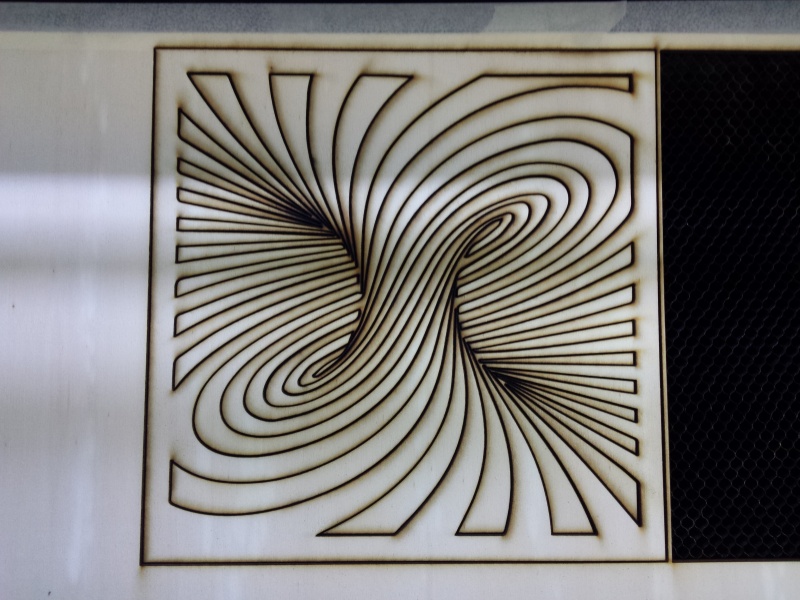 File:Laser cut wooden art.jpg