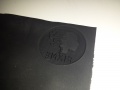 Rubber stamp closeup after engraving whilst still in sheet.jpg